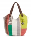 The Sak contrasts the rich leather body on their hold-it-all Indio Leather tote with tactile, woven handles.