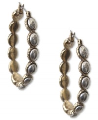 Fashion from the past, reinvented by Lucky Brand. These hippie-chic earrings feature a gold tone oblong shape with silver tone inlay accents. Crafted in gold tone and silver tone mixed metal. Approximate drop: 1-5/8 inches. Fashion from the past, reinvented by Lucky Brand. These hippie-chic earrings feature a gold tone oblong shape with silver tone inlay accents. Crafted in gold tone and silver tone mixed metal. Approximate drop: 1-5/8 inches.