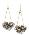 Group dynamic. Silver-colored cherry beads come together in stunning fashion in this pair of teardrop earrings from Kenneth Cole New York. The earrings are crafted from gold-tone mixed metal. Approximate drop: 2 inches.