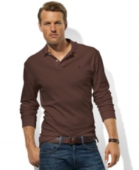 An iconic long-sleeved polo shirt embroidered with Ralph Lauren's iconic pony is cut for a classic fit in smooth, soft cotton interlock. An iconic long-sleeved polo shirt embroidered with Ralph Lauren's iconic pony is cut for a classic fit in smooth, soft cotton interlock.