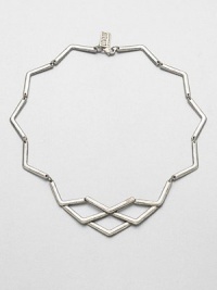 A graphic design with angled links that create a visually unique design. SilverplatedLength, about 16Lobster clasp closureMade in USA A graphic design with angled links that create a visually unique design. SilverplatedLength, about 16Lobster clasp closureMade in USA