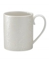 A soft, feminine look with Denby durability, the Lucille Gold can mug promises lasting style and modern grace. In a pattern inspired by vintage lace and designed by English stylemaker, Monsoon, shimmering gold swirls adorn creamy porcelain in this set of dinnerware. The dishes are beautiful for every day and occasion.