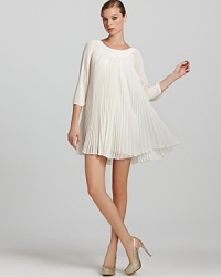 Intricately pleated chiffon creates a swingy silhouette on this short and sweet ERIN Erin Fetherston dress. Intricately pleated chiffon creates a swingy silhouette on this short and sweet ERIN Erin Fetherston dress.