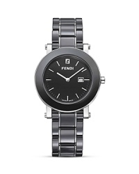 A polished timepiece from Fendi featuring a scratch-resistant ceramic bezel and date window. A polished timepiece from Fendi featuring a scratch-resistant ceramic bezel and date window.