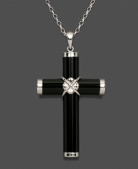 A dramatic interpretation of a traditional cross pendant. Tubular black onyx (7 mm) wrapped in sterling silver accents makes quite an impact. Necklace crafted in sterling silver. Approximate length: 18 inches. Approximate drop:1-1/4 inches. A dramatic interpretation of a traditional cross pendant. Tubular black onyx (7 mm) wrapped in sterling silver accents makes quite an impact. Necklace crafted in sterling silver. Approximate length: 18 inches. Approximate drop:1-1/4 inches.