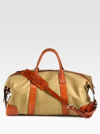 An ideal size for travel, this heritage duffel is rendered in durable leather with a removable reinforced leather shoulder strap for versatile on-the-go styling.Zip closureDouble top handlesAdjustable shoulder strapInterior zip pocketEmbossed signature leather luggage tagReinforced with leather at the bottomCotton twill liningLeather24W x 12H x 10DImported