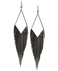 A trendy twist. Drop earrings always have an eye-catching effect, but GUESS' tassel version conveys a chic, bohemian vibe. Crafted in hematite tone mixed metal. Approximate drop: 3 inches. A trendy twist. Drop earrings always have an eye-catching effect, but GUESS' tassel version conveys a chic, bohemian vibe. Crafted in hematite tone mixed metal. Approximate drop: 3 inches.