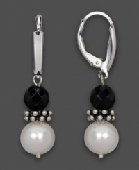 Opposites attract. Faceted black onyx (6 mm) and sleek cultured freshwater pearl (7-8 mm) come together exquisitely in these drops. Earrings crafted in sterling silver. Approximate drop: 1-1/2 inches. Opposites attract. Faceted black onyx (6 mm) and sleek cultured freshwater pearl (7-8 mm) come together exquisitely in these drops. Earrings crafted in sterling silver. Approximate drop: 1-1/2 inches.