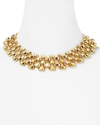 This Michael Kors necklace refines the (be) deck, cast in two tone plated metal with a bold, open link design. This Michael Kors necklace refines the (be) deck, cast in two tone plated metal with a bold, open link design.