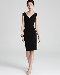 Escada's sleek scuba jersey dress flaunts a form-fitting silhouette with lustrous exposed zip detail along the side seam and flattering ruching. Escada's sleek scuba jersey dress flaunts a form-fitting silhouette with lustrous exposed zip detail along the side seam and flattering ruching.