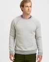 Defined by expert craftsmanship and attention to detail, this modern crewneck sweater features exposed seams, ribbed knit trim and a textured finish for a heritage-inspired feel.CrewneckBanded cuffs and hem70% wool/30% cashmereMachine washImported