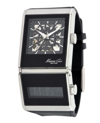 Embrace trend and tradition with this dual time watch by Kenneth Cole New York. Black polyurethane strap and rectangular stainless steel case. Dual dial features analog display at top with black skeleton dial, silver tone stick indices, minute track, luminous hands and logo. Bottom dial features a negative digital display. Automatic and digital movement. Water resistant to 30 meters. Limited lifetime warranty. Embrace trend and tradition with this dual time watch by Kenneth Cole New York. Black polyurethane strap and rectangular stainless steel case. Dual dial features analog display at top with black skeleton dial, silver tone stick indices, minute track, luminous hands and logo. Bottom dial features a negative digital display. Automatic and digital movement. Water resistant to 30 meters. Limited lifetime warranty.