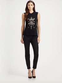 Sleek stretch jersey, embellished with an ornate embroidered design.Jewel necklineSleevelessEmbroidered frontConcealed back zip85% viscose/11% polyester/4% elastaneDry cleanMade in USA of Italian fabricModel shown is 5'11 (180cm) wearing US size 4. Sleek stretch jersey, embellished with an ornate embroidered design.Jewel necklineSleevelessEmbroidered frontConcealed back zip85% viscose/11% polyester/4% elastaneDry cleanMade in USA of Italian fabricModel shown is 5'11 (180cm) wearing US size 4.