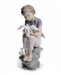 Experience tranquility. Perched on a rock embracing the simple joys in life, a graceful young lady studies the beauty and purity of visiting doves. A peaceful reminder to slow down and study the brilliant details in life, by Lladro. Experience tranquility. Perched on a rock embracing the simple joys in life, a graceful young lady studies the beauty and purity of visiting doves. A peaceful reminder to slow down and study the brilliant details in life, by Lladro.