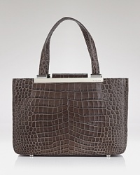 With the perfect blazer and sleek patent pumps, this MICHAEL Michael Kors croc-embossed tote completes the accessories picture.