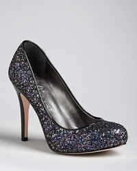 Glitter and a patent heel makes this pair of IVANKA TRUMP platform pumps shine. Glitter and a patent heel makes this pair of IVANKA TRUMP platform pumps shine.
