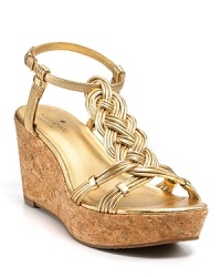 In gleaming gold, the braided Becca T-strap wedges are toned down with a cork wedge. From kate spade new york. In gleaming gold, the braided Becca T-strap wedges are toned down with a cork wedge. From kate spade new york.