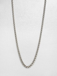 An intricate wheat link chain design in sleek sterling silver thats perfect with your favorite enhancers or alone. Sterling silverLength, about 18Lobster clasp closureMade in USA