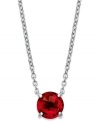 Brilliant like a summer sunset. Round-cut garnet (3 ct. t.w.) adorns this delicate sterling silver pendant. Approximate length: 18 inches. Approximate drop: 1 inch.