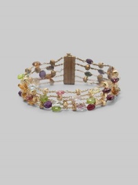 Five delicate chains, sprinkled with a colorful array of faceted semi-precious stones and textured gold rondelles, joined by a sleek bar clasp. May include tourmaline, quartz, peridot, rhodolite garnet, iolite, tanzanite, aquamarine and apatite 18k yellow gold Length, about 7½ Width, about 1 Bar clasp Made in Italy Please note: Stones may vary. Five delicate chains, sprinkled with a colorful array of faceted semi-precious stones and textured gold rondelles, joined by a sleek bar clasp. May include tourmaline, quartz, peridot, rhodolite garnet, iolite, tanzanite, aquamarine and apatite 18k yellow gold Length, about 7½ Width, about 1 Bar clasp Made in Italy Please note: Stones may vary.