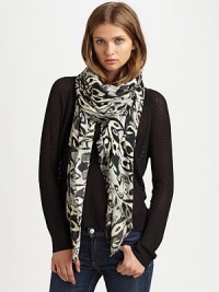 A striking ikat print refreshes this lengthy, lightweight scarf. ViscoseAbout 60 X 60Dry cleanImported
