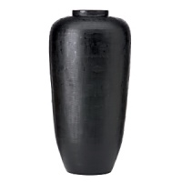 The timeless shape of this black Donna Karan vase lends a sleek yet heirloom silhouette to your décor. The timeless shape of this black Donna Karan vase lends a sleek yet heirloom silhouette to your décor.