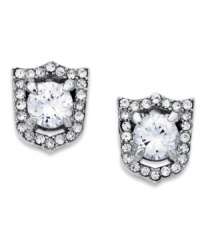 Display your impeccable style with these stud earrings from Juicy couture. In a shield design, they flaunt glistening crystal accents for a lasting effect. Crafted in silver tone mixed metal. Approximate diameter: 1/4 inch. Display your impeccable style with these stud earrings from Juicy couture. In a shield design, they flaunt glistening crystal accents for a lasting effect. Crafted in silver tone mixed metal. Approximate diameter: 1/4 inch.