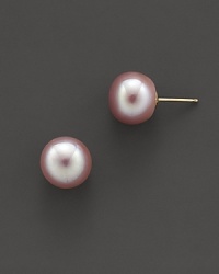 Cultured, freshwater lavender pearl stud earrings. Cultured, freshwater lavender pearl stud earrings.