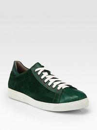 Crafted from sumptuous suede and smooth leather, this vibrant style takes a classic low top to the next level.Suede/leather upperLeather liningPadded insoleRubber soleImported Crafted from sumptuous suede and smooth leather, this vibrant style takes a classic low top to the next level.Suede/leather upperLeather liningPadded insoleRubber soleImported