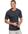 Ready to run? Gear up to go with this fitted Nike t-shirt with Dri-Fit technology for increased dryness and comfort.