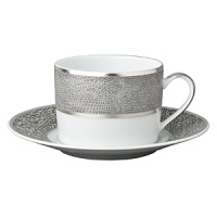 Sauvage teacup by Bernadaud successfully blends three surprisingly sensual touches - pearl-grey lizard skin, silver filament and interlocking Cordovan honeycombs -- into one truly memorable collection for your table. Exceptional elegance with a touch of the exotic. Sauvage teacup by Bernadaud successfully blends three surprisingly sensual touches - pearl-grey lizard skin, silver filament and interlocking Cordovan honeycombs -- into one truly memorable collection for your table. Exceptional elegance with a touch of the exotic.