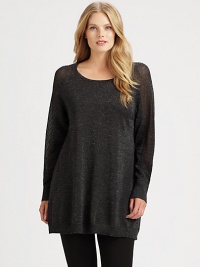 Designed to turn heads, a relaxed-fit sweater with glamorous shimmer, alluring mesh sleeves and classic ribbed-knit trim. Wear this style with leggings or denim leggings for an enviable everyday look. Round neckRaglan sleevesRibbed trimPull-on styleAbout 31 from shoulder to hemMerino wool/polyester/metallic threadDry cleanImported Designed to turn heads, a relaxed-fit sweater with glamorous shimmer, alluring mesh sleeves and classic ribbed-knit trim. Wear this style with leggings or denim leggings for an enviable everyday look. Round neckRaglan sleevesRibbed trimPull-on styleAbout 31 from shoulder to hemMerino wool/polyester/metallic threadDry cleanImported