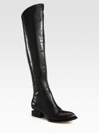 A sleek asymmetrical shaft and inverted heel upgrade this urban-ready leather design. Stacked heel, 1½ (40mm)Shaft, 21Leg circumference, 14½Leather upperBack zipLeather lining and solePadded insoleImported A sleek asymmetrical shaft and inverted heel upgrade this urban-ready leather design. Stacked heel, 1½ (40mm)Shaft, 21Leg circumference, 14½Leather upperBack zipLeather lining and solePadded insoleImported