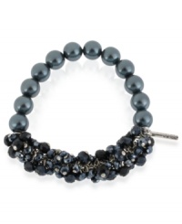 Two halves make quite the whole. Kenneth Cole New York's half stretch bracelet is crafted from silver-tone mixed metal, with navy glass pearls and beads boosting the style factor. Item comes packaged in a signature Kenneth Cole New York Gift Box. Approximate length: 7-1/2 inches. Approximate width: 5/8 inch. Two halves make quite the whole. Kenneth Cole New York's half stretch bracelet is crafted from silver-tone mixed metal, with navy glass pearls and beads boosting the style factor. Item comes packaged in a signature Kenneth Cole New York Gift Box. Approximate length: 7-1/2 inches. Approximate width: 5/8 inch.