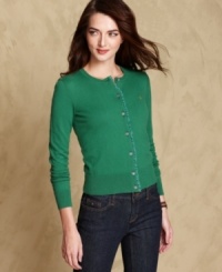 Tommy Hilfiger's solid cardigan offers a preppy touch to any ensemble. Pair it with jeans or with a chic little dress. Tommy Hilfiger's solid cardigan offers a preppy touch to any ensemble. Pair it with jeans or with a chic little dress.