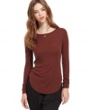 With a an allover ribbed knit and rounded hem, this RACHEL Rachel Roy top is a must-have for wear-with-anything staples!