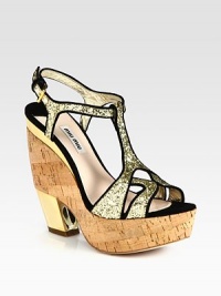 Glitter leather and suede-trimmed straps finished with a natural cork wedge and metallic heel. Cork wedge with metallic heel, 5½ (140mm)Cork platform, 1 (25mm)Compares to a 4½ heel (115mm)Glitter leather and suede upperLeather lining and solePadded insoleImported