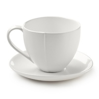 Borrowing from nature, these porcelain cups and saucers have a highly glossed surface and unusual contours, creating an interesting silhouette - a DVF signature - on the table. Borrowing from nature, these porcelain cups and saucers have a highly glossed surface and unusual contours, creating an interesting silhouette - a DVF signature - on the table.