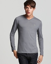 A clean-cut pima cotton v-neck tee with tonal embroidery at the left chest. A clean-cut pima cotton v-neck tee with tonal embroidery at the left chest.