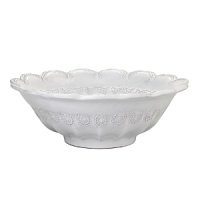A must-have, handmade statement piece from the Incanto collection, this scalloped edge bowl is perfect for serving pasta or salad at a dinner party, or as a decorative piece for the table. A must-have, handmade statement piece from the Incanto collection, this scalloped edge bowl is perfect for serving pasta or salad at a dinner party, or as a decorative piece for the table.