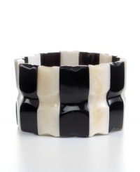 Cow horn turned chic. Handcrafted by talented Haitian artisans, this beaded stretch bracelet brings bold, organic style and new meaning to your jewelry collection in an alternating light and dark design. Cow horn turned chic. Handcrafted by talented Haitian artisans, this beaded stretch bracelet brings bold, organic style and new meaning to your jewelry collection in an alternating light and dark design.