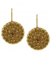 A golden example of modern style, these Vince Camuto earrings feature topaz-colored pave stones on drop discs. Crafted in gold tone mixed metal. Approximate drop: 1-1/4 inches.