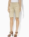 Rendered in sleek stretch twill, Huldah Bermuda shorts are a sophisticated warm weather staple.