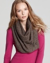 Bring on subtle bling with Echo's infinity loop scarf, embellished with sequins for a shimmering warmth.