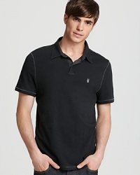 Give peace a chance in this calm, cool and collected polo from John Varvatos Star USA, detailed with contrast stitching for unique allover accents and tailored for a slim, modern fit. Give peace a chance in this calm, cool and collected polo from John Varvatos Star USA, detailed with contrast stitching for unique allover accents and tailored for a slim, modern fit.