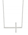 A stunning testament. This necklace features a sideways cross with cubic zirconia accents adding a lustrous touch. Crafted from sterling silver. Approximate length: 18 inches. Approximate drop length: 3/4 inch. Approximate drop width: 1-3/8 inches.