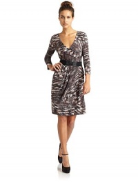 THE LOOKMulticolor abstract print alloverSurplice v-neck Three-quarter length sleevesSeamed waistElastic belt with hook bucklePleated faux wrap skirtTHE FITAbout 36 from shoulder to hemTHE MATERIAL95% polyester/5% spandexCARE & ORIGINDry cleanImportedModel shown is 5'8 (172½cm) wearing US size Small. THE LOOKMulticolor abstract print alloverSurplice v-neck Three-quarter length sleevesSeamed waistElastic belt with hook bucklePleated faux wrap skirtTHE FITAbout 36 from shoulder to hemTHE MATERIAL95% polyester/5% spandexCARE & ORIGINDry cleanImportedModel shown is 5'8 (172½cm) wearing US size Small.