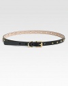 Solid leather belt with eye-catching stud accents and logo-engraved, antique gold buckle.About .6 wideMade in Italy 