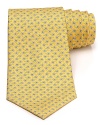 A silk tie adds distinction and flair to your formal presentation. With a repeating pattern of flowers, you'll also punch up your attire with a bit of handsome elegance.