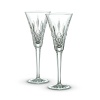 So treasured and so timeless, the beauty of this pair of Lismore toasting flutes grows with love. Between the intricate diamond and wedge cuts and the perfect fit in your hands, you will enjoy using or giving them to celebrate special occasions.